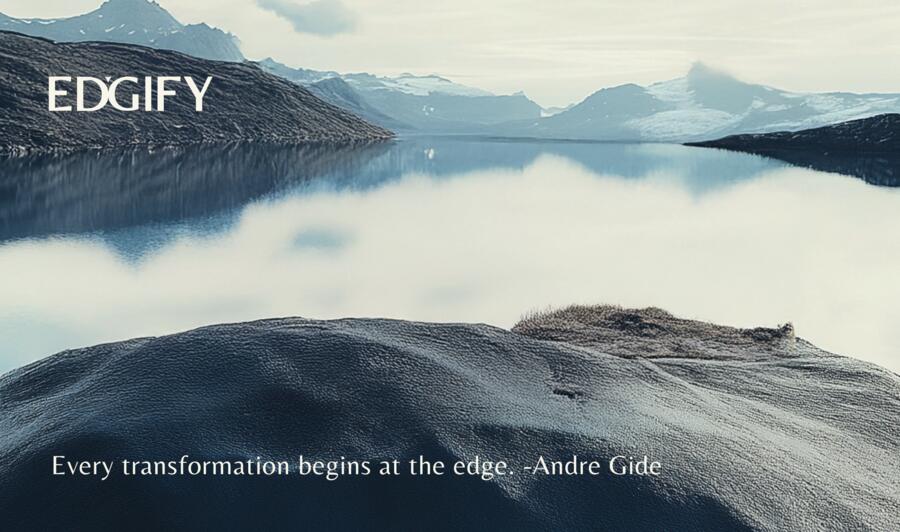 Identity study — a still glacial lake reflecting cloud between dark ridges and snow-capped peaks